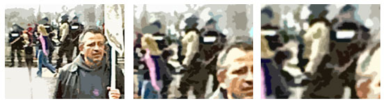 Police in riot gear with peaceful protestor